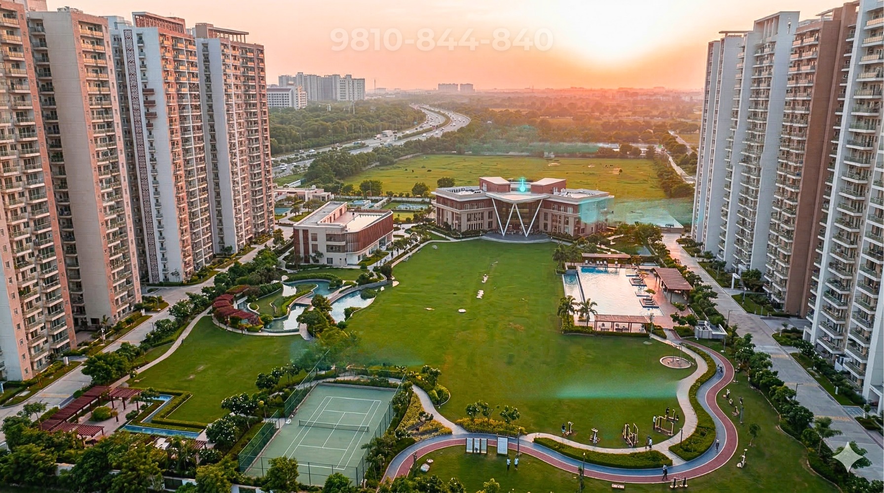 Aerial view with clubhouse and greens
